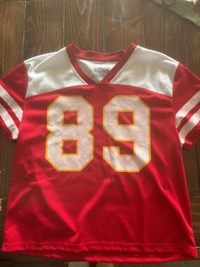 Women’s Red Athletic Jersey Top with White Accents and Number 89